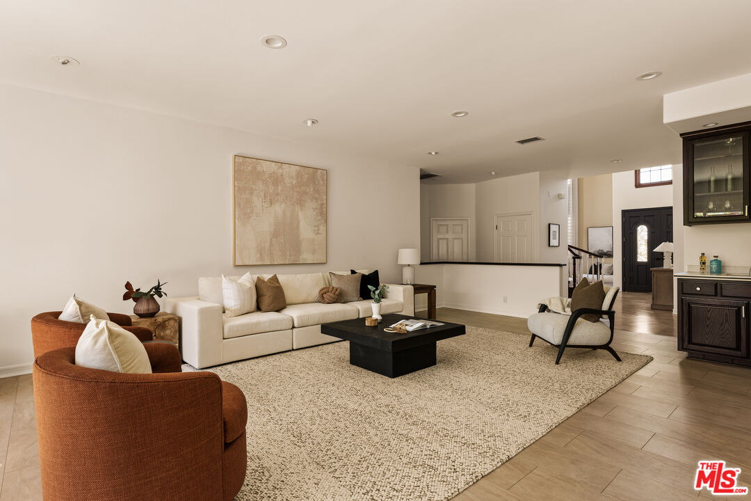 7825 Cowan Avenue Los Angeles, CA 90045 - Photo 6 of 33 a living room with furniture and a table