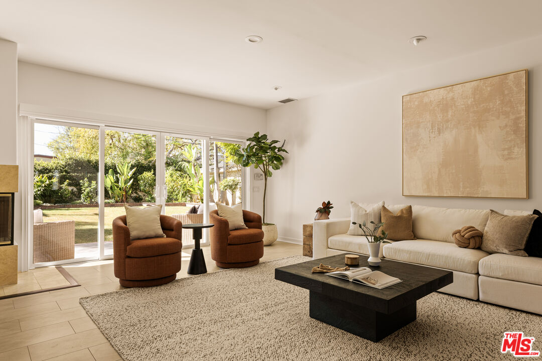 7825 Cowan Avenue Los Angeles, CA 90045 - Photo 8 of 33 a living room with furniture and a large window