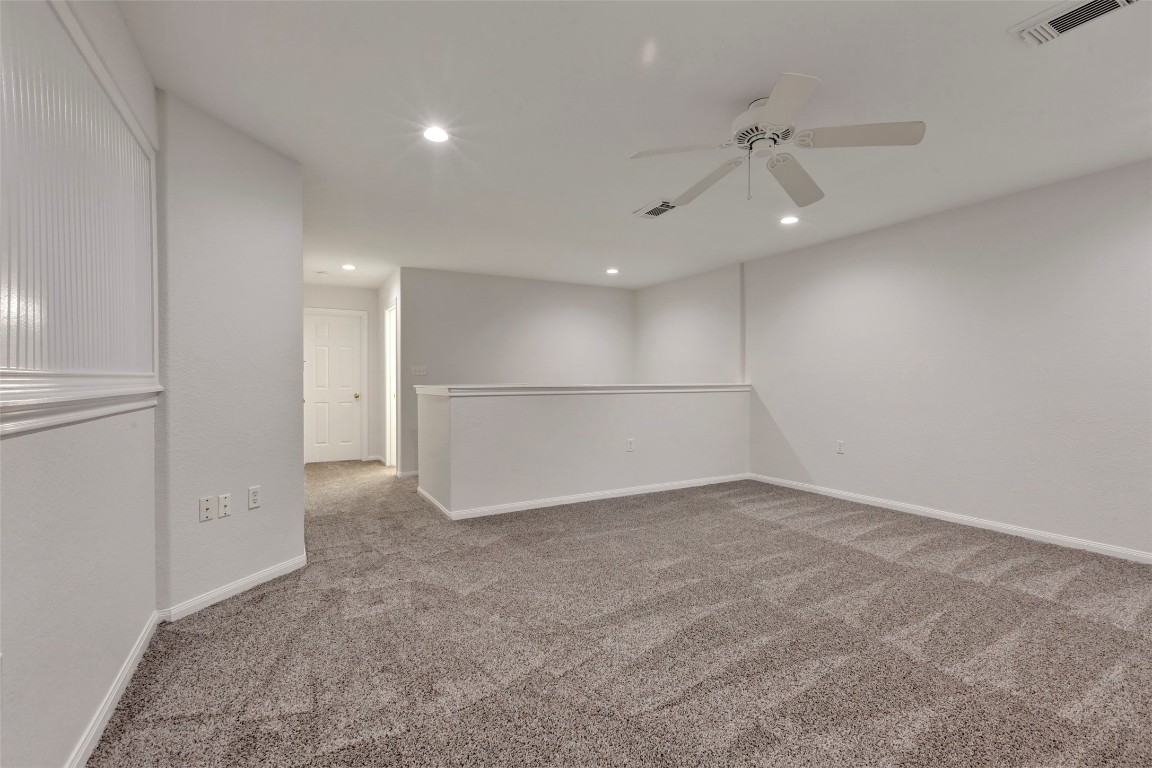 770 Hunt Road, Unit 212 Baytown, TX 77521 - Photo 33 of 40 an empty room with a empty space and windows
