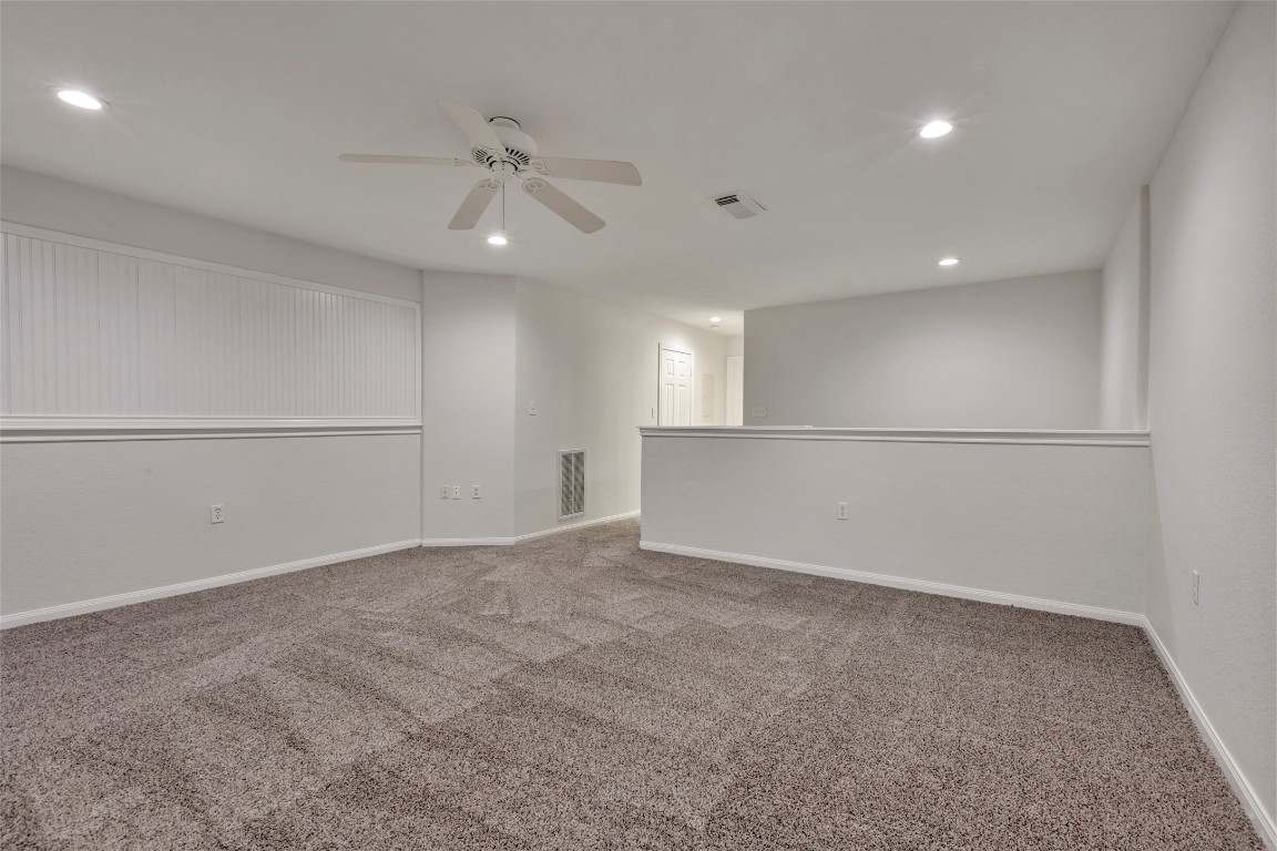770 Hunt Road, Unit 212 Baytown, TX 77521 - Photo 34 of 40 an empty room with an entryway and fan