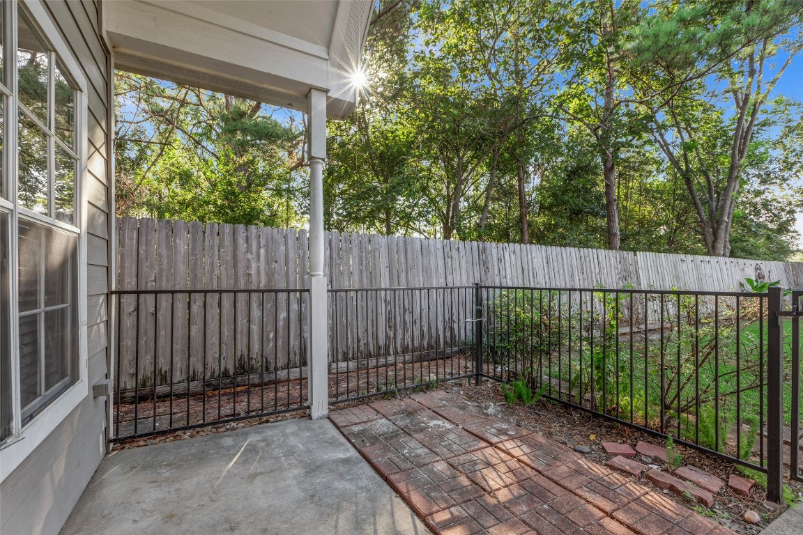 770 Hunt Road, Unit 212 Baytown, TX 77521 - Photo 7 of 40 a view of outdoor space with wooden fence