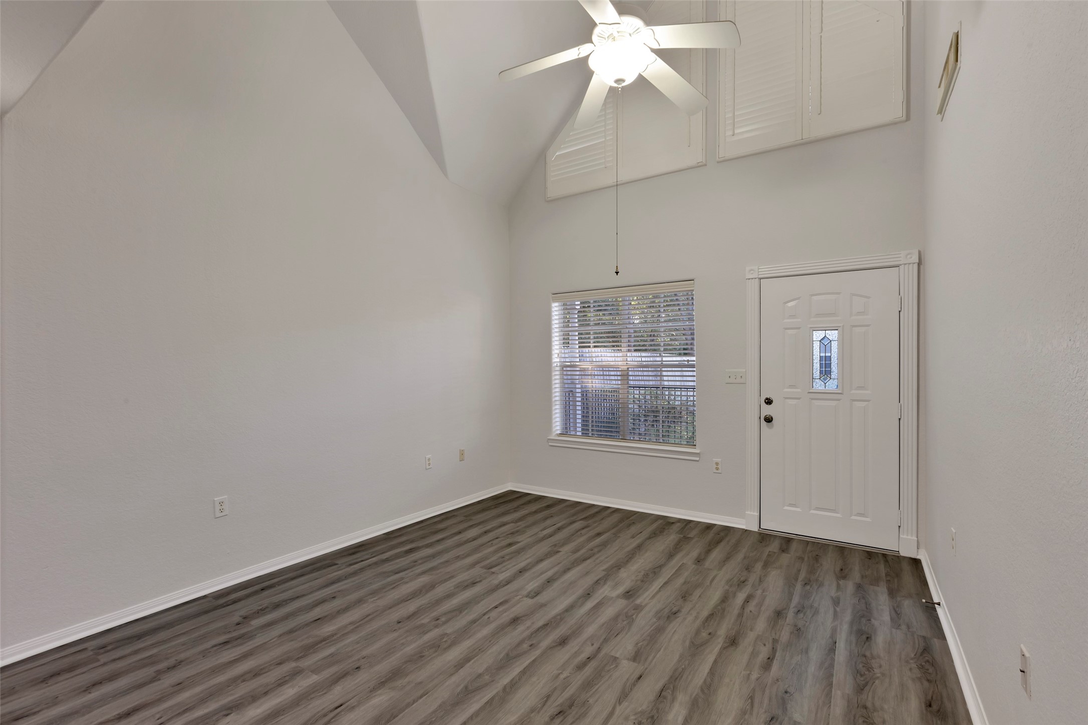 770 Hunt Road, Unit 212 Baytown, TX 77521 - Photo 8 of 40 wooden floor in an empty room with a window