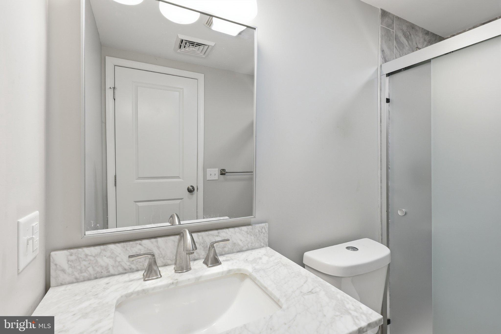 125 Ashland Drive Ridgeley, WV 26753 - Photo 19 of 41 Sleek modern bathroom with elegance.