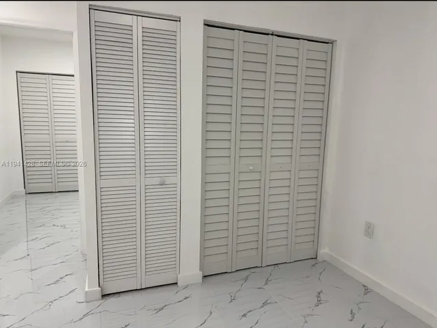 a view of kitchen and utility room