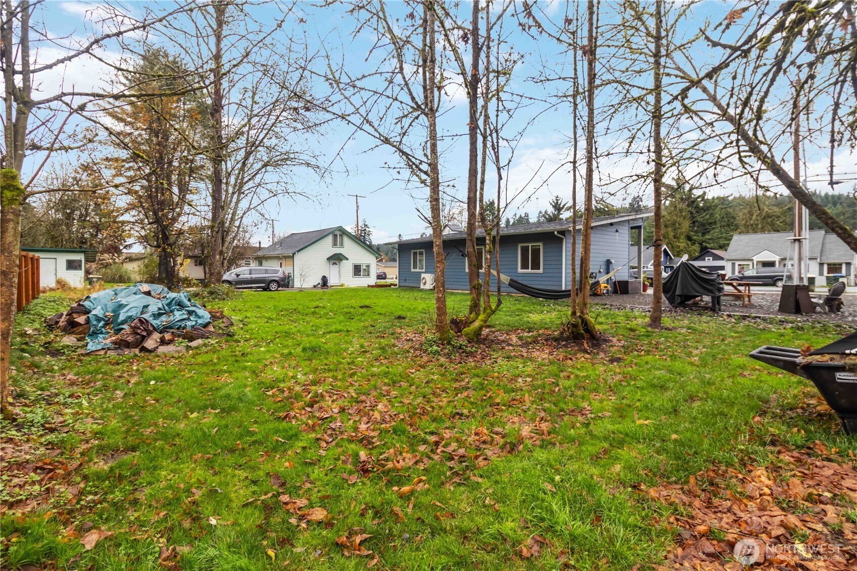 810 Southeast 1st Street Winlock, WA 98596 - Photo 14 of 35 a view of a house with a yard and tree s