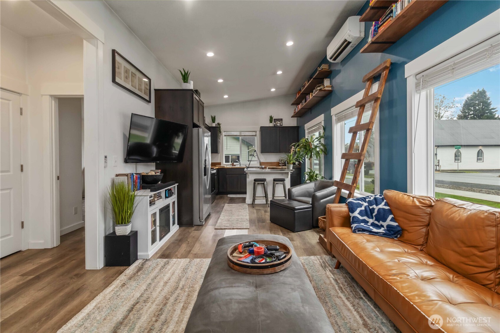 810 Southeast 1st Street Winlock, WA 98596 - Photo 22 of 35 a living room with furniture fireplace and flat screen tv