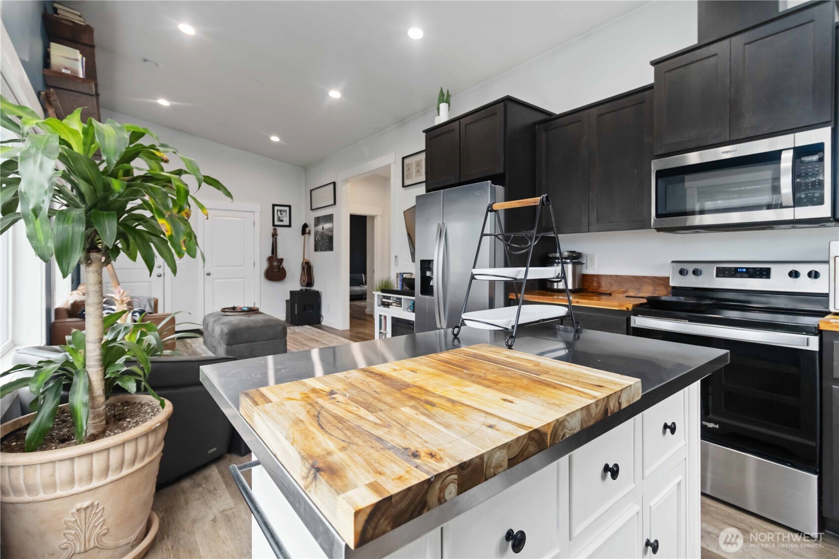 810 Southeast 1st Street Winlock, WA 98596 - Photo 28 of 35 a kitchen with sink and refrigerator
