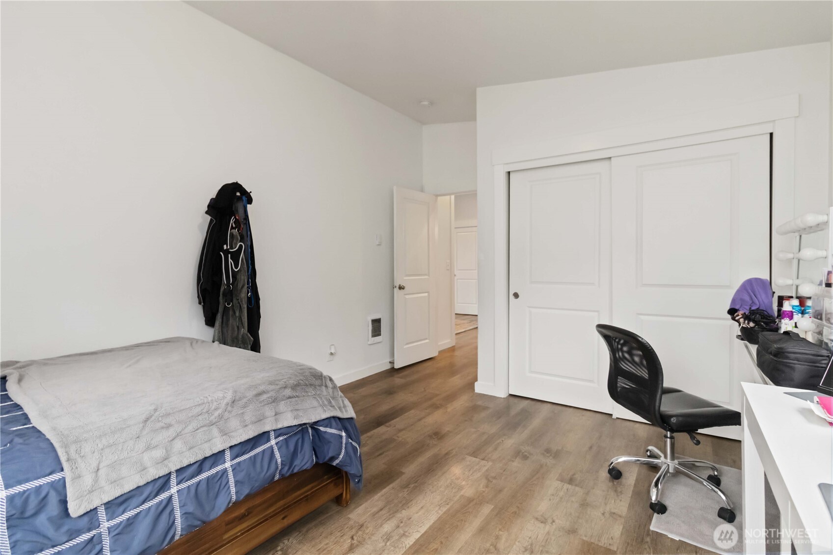 810 Southeast 1st Street Winlock, WA 98596 - Photo 33 of 35 a bedroom with a bed and a chair