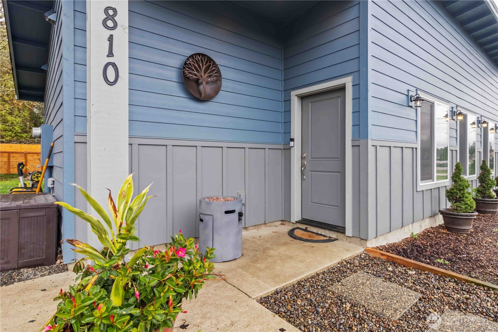 810 Southeast 1st Street Winlock, WA 98596 - Photo 7 of 35 a view of a door and chair in back of the house