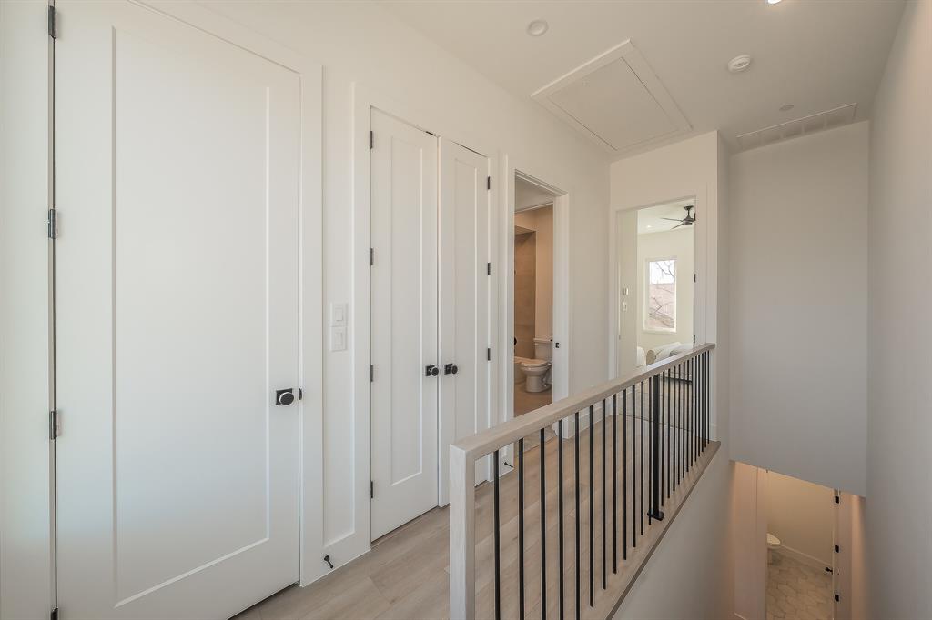 5320 Reiger Avenue, Unit 102 Dallas, TX 75214 - Photo 12 of 33 a view of a hallway with wooden floor and entryway