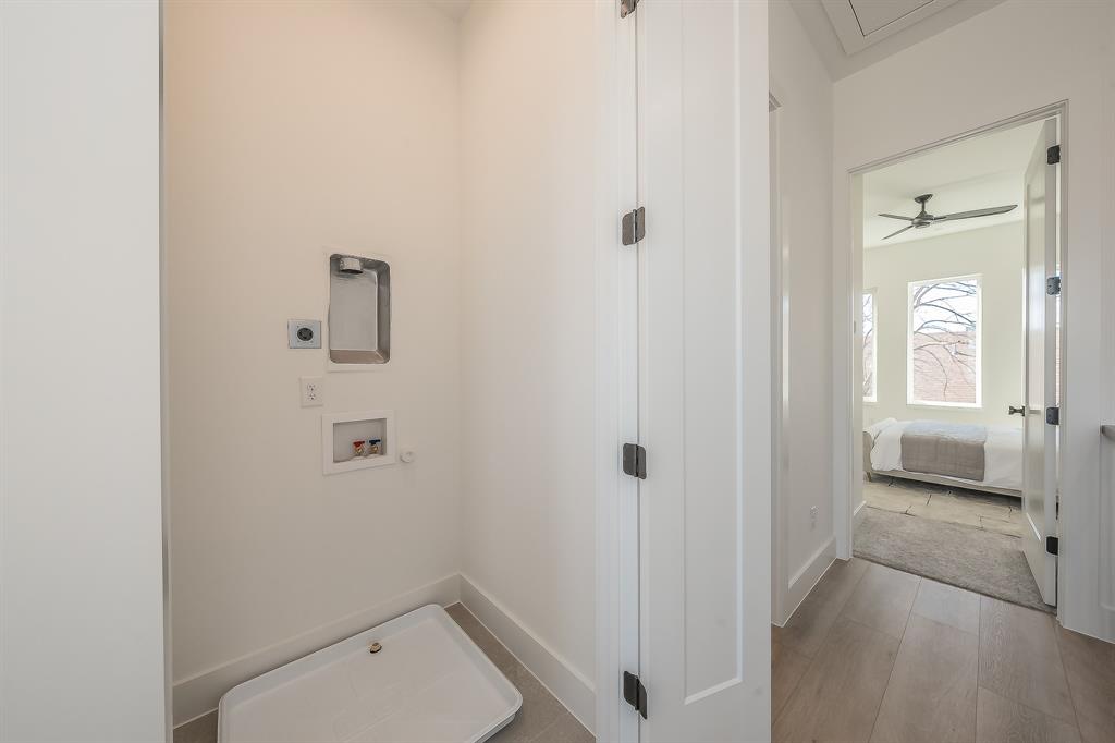 5320 Reiger Avenue, Unit 102 Dallas, TX 75214 - Photo 13 of 33 a bathroom with a toilet and a shower