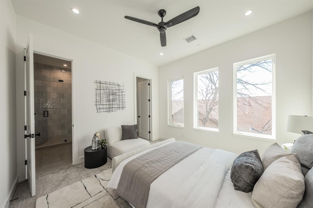 5320 Reiger Avenue, Unit 102 Dallas, TX 75214 - Photo 15 of 33 a bedroom with a bed and window