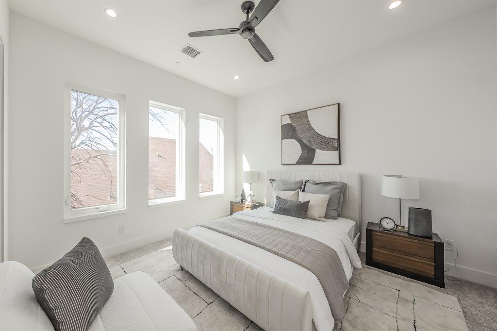 5320 Reiger Avenue, Unit 102 Dallas, TX 75214 - Photo 16 of 33 a bedroom with furniture and a window