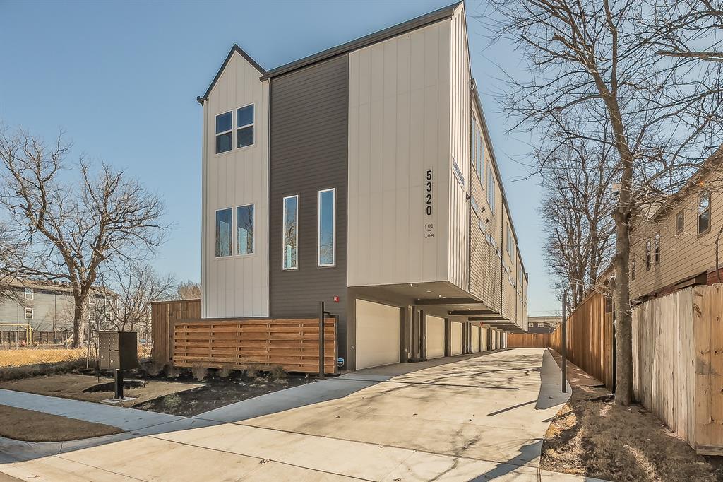 5320 Reiger Avenue, Unit 102 Dallas, TX 75214 - Photo 27 of 33 a view of a white building in front of house