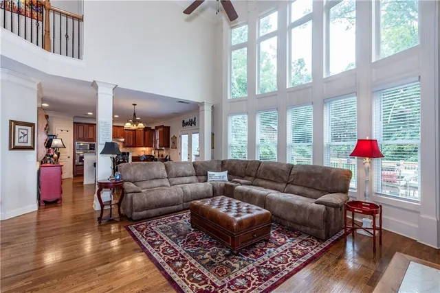 a living room with furniture and a fireplace