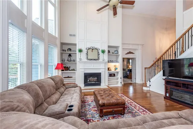 a kitchen with stainless steel appliances granite countertop a refrigerator stove and oven