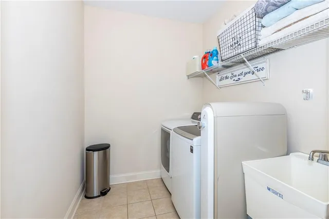 a bathroom with a bathtub sink and mirror
