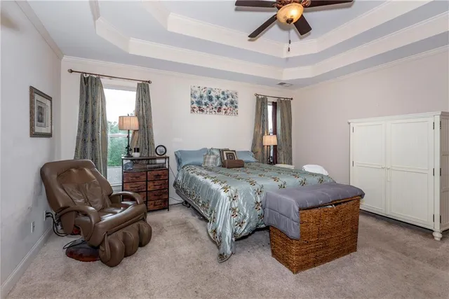 a bathroom with a tub toilet and a shower