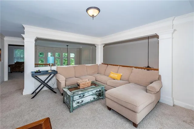 a bathroom with a double vanity sink a toilet and a mirror