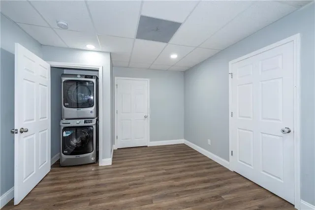 a bathroom with a double vanity sink mirror and toilet