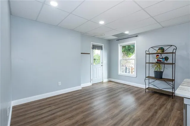 a kitchen with a stove microwave and sink