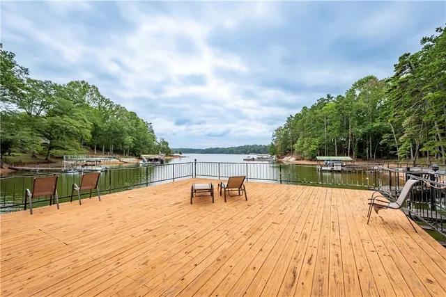a view of a swimming pool with a lake view