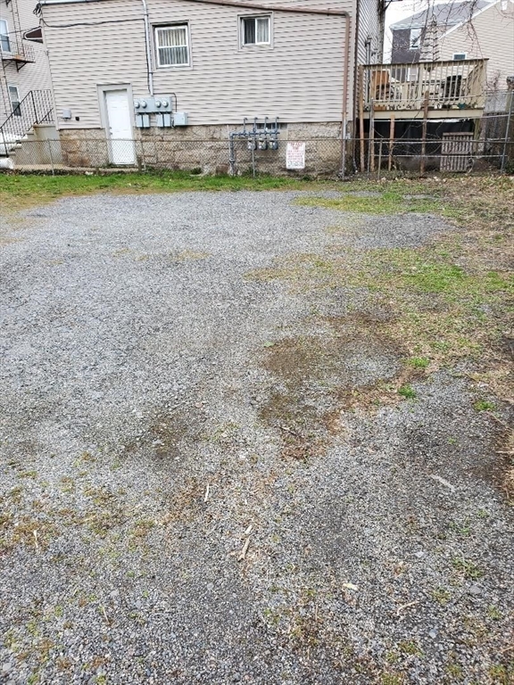 762 Globe Street, Unit 2 Fall River, MA 02724 - Photo 20 of 20 a view of a house with a yard
