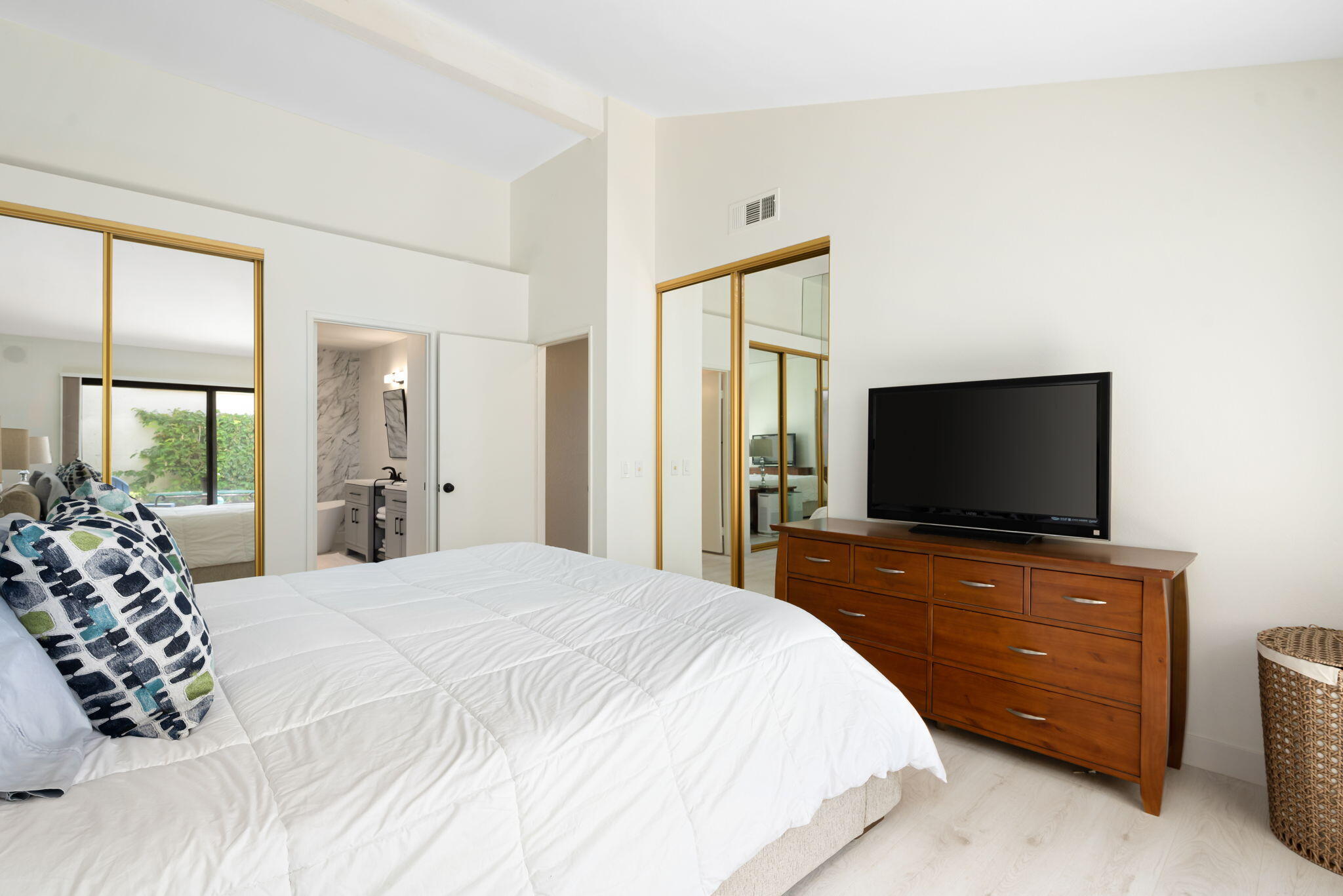 54912 Shoal Creek La Quinta, CA 92253 - Photo 17 of 36 a bedroom with a bed and a flat screen tv