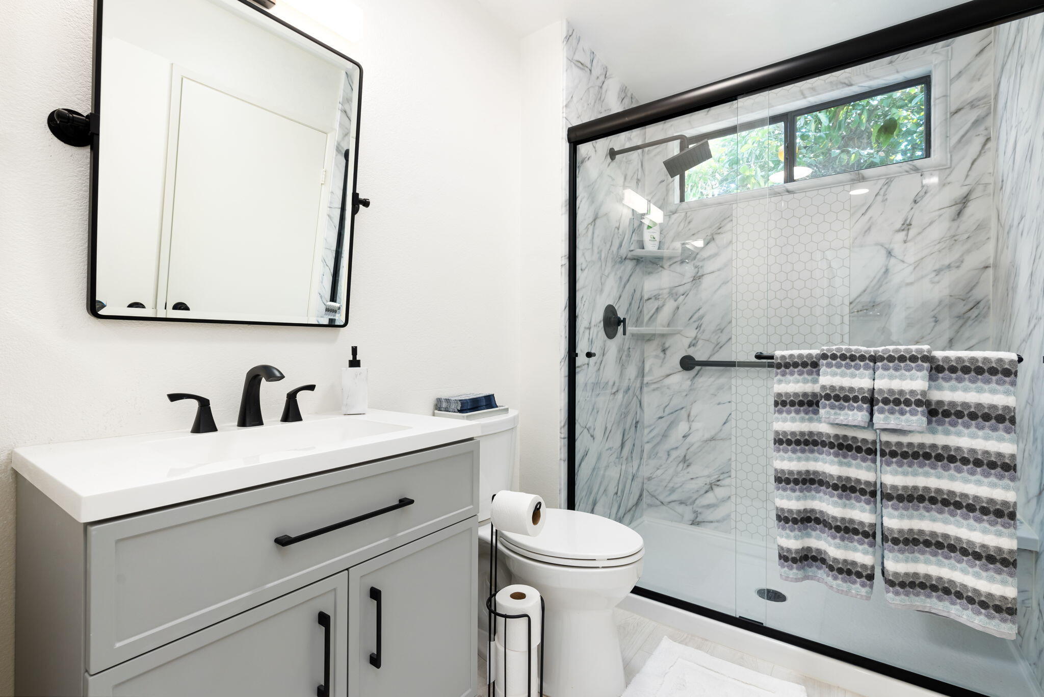 54912 Shoal Creek La Quinta, CA 92253 - Photo 22 of 36 a bathroom with a sink a toilet and a mirror
