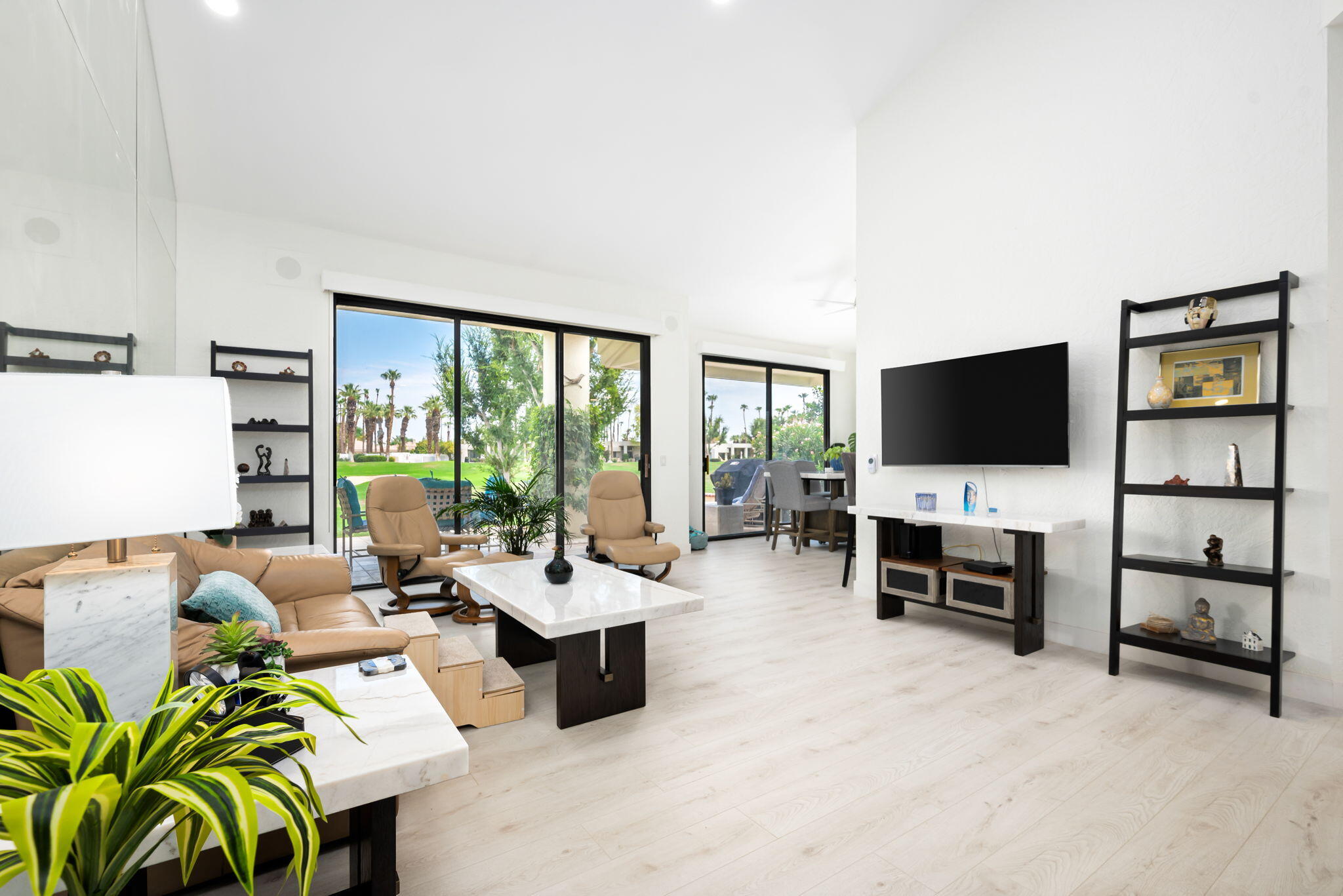 54912 Shoal Creek La Quinta, CA 92253 - Photo 5 of 36 a living room with furniture and a flat screen tv