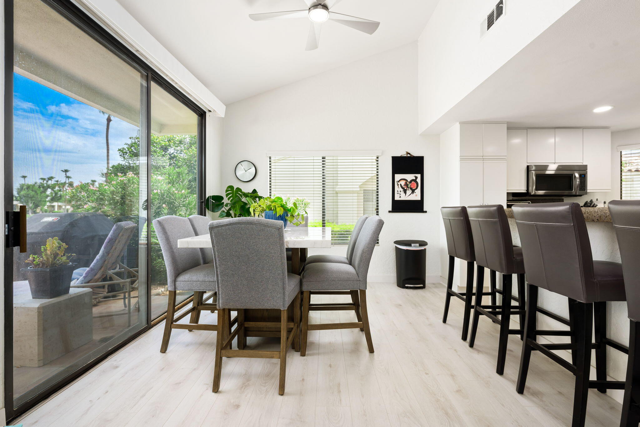 54912 Shoal Creek La Quinta, CA 92253 - Photo 9 of 36 a view of a dining room with furniture window and outside view