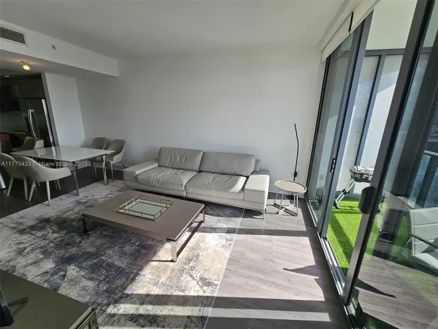 a living room with a large window