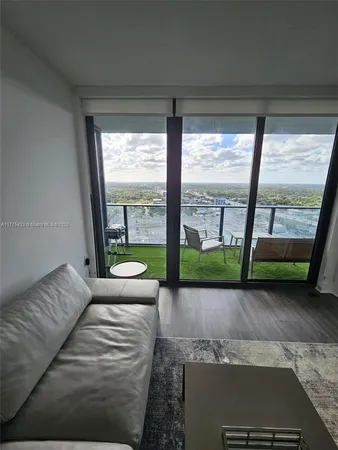 a living room with a large window