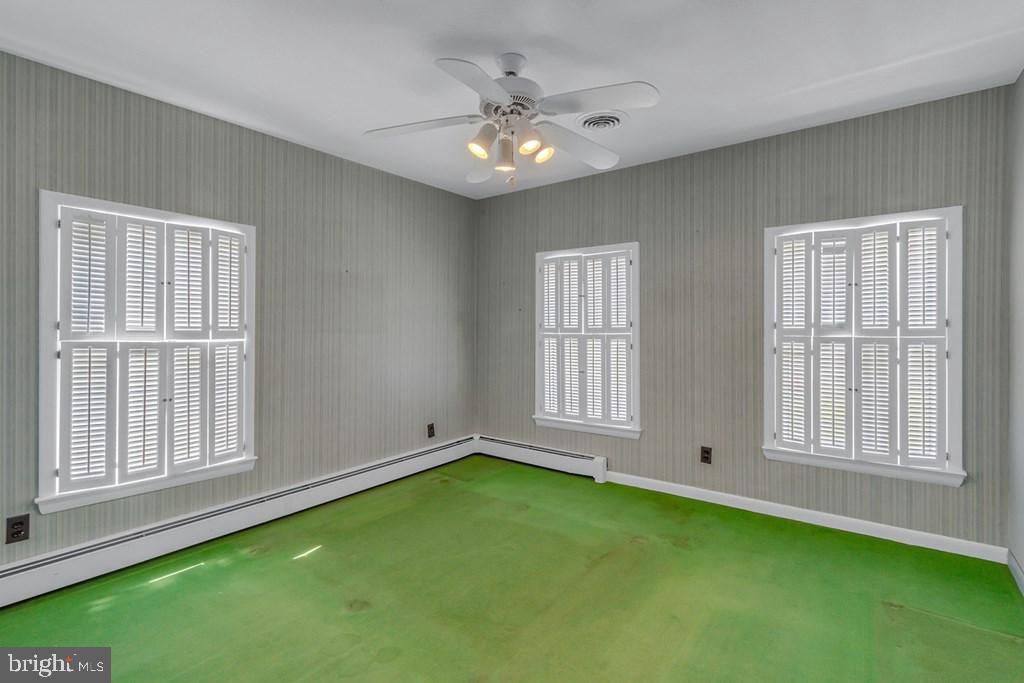 742 Main Street Reedville, VA 22539 - Photo 20 of 66 Bright, airy room with unique charm.