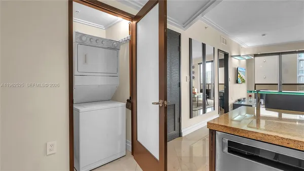 a kitchen with a refrigerator and countertop