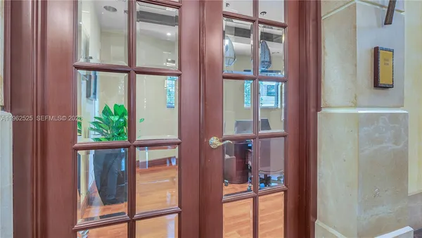 a living room with furniture window and wooden floor