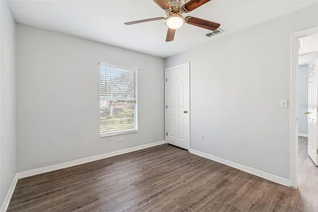 a view of a yard with tree s