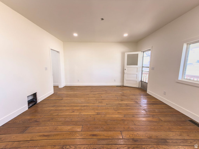 2454 East Old Wellington Road Price, UT 84501 - Photo 8 of 27 Family Room with Fresh Paint and Reclaimed 3/4 in Oak Floors and New Lighting