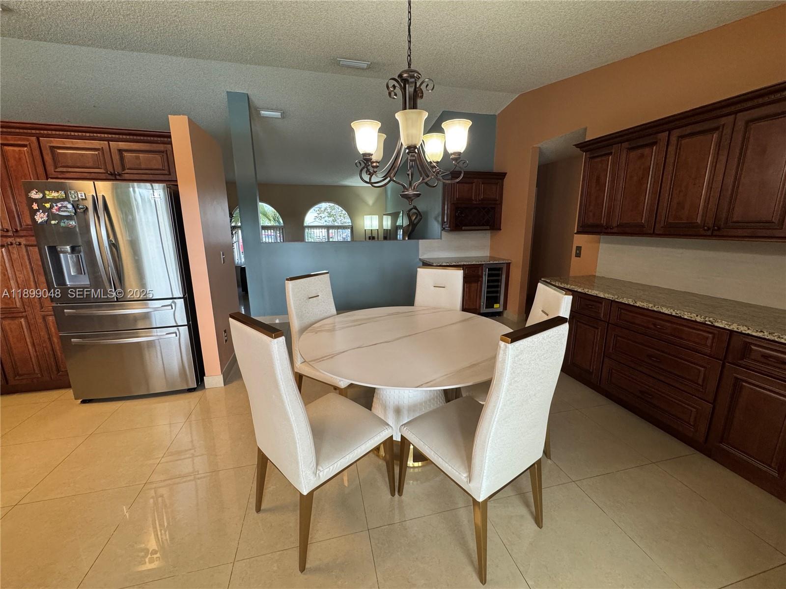 14700 Southwest 151st Terrace Miami, FL 33196 - Photo 9 of 19 a view of a dining room with furniture