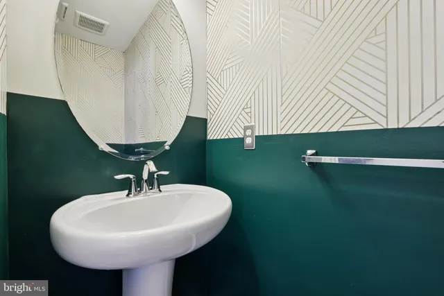 a sink with a mirror