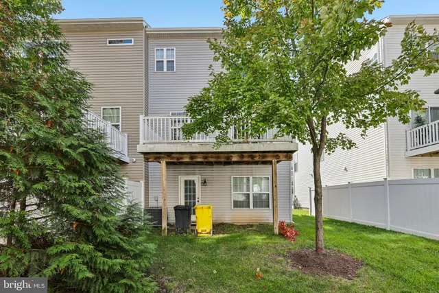 a front view of a building with a street