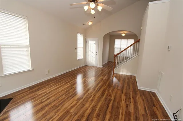 a view of entryway with wooden floor