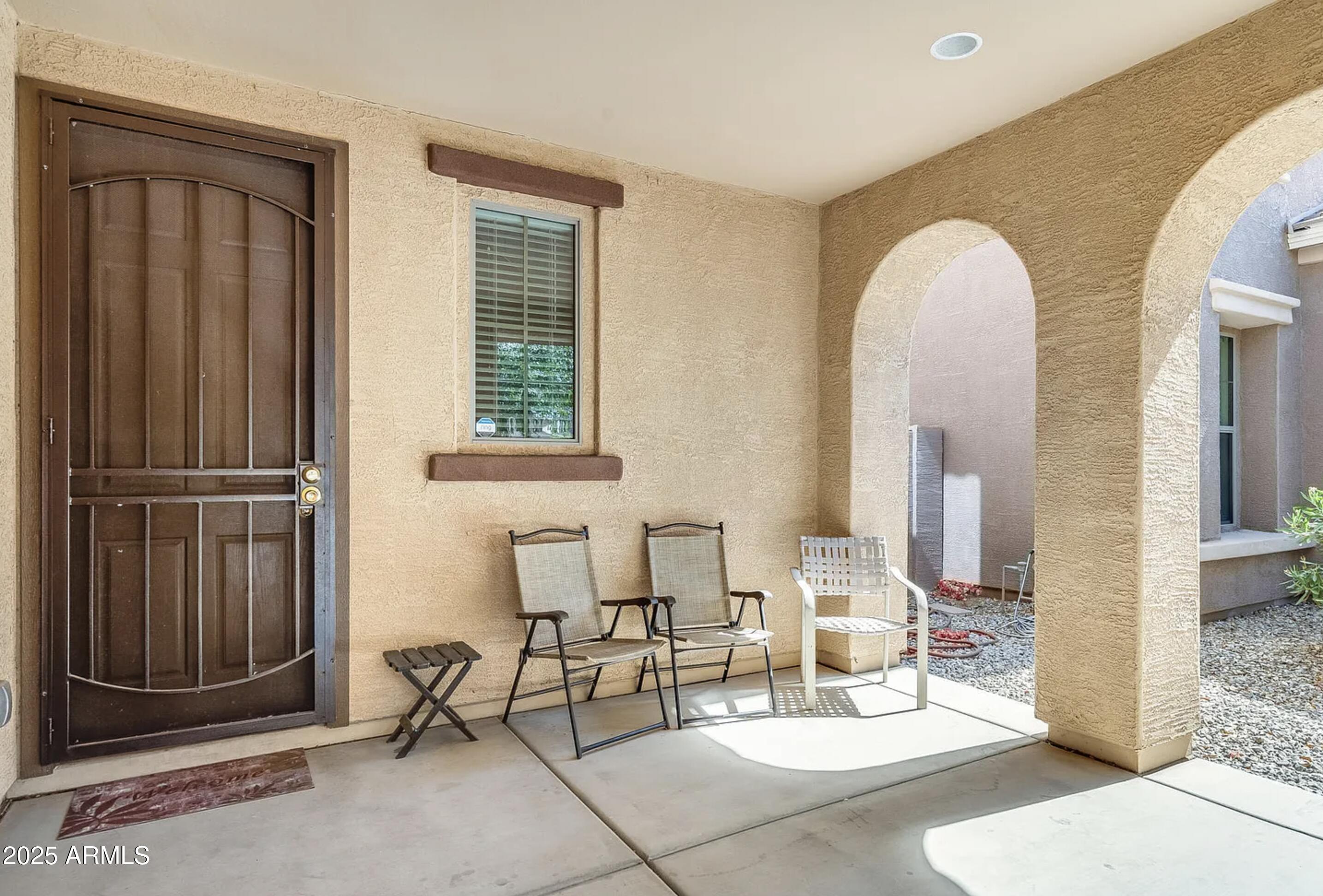 2542 West Gaby Road Phoenix, AZ 85041 - Photo 4 of 12 a living room with furniture