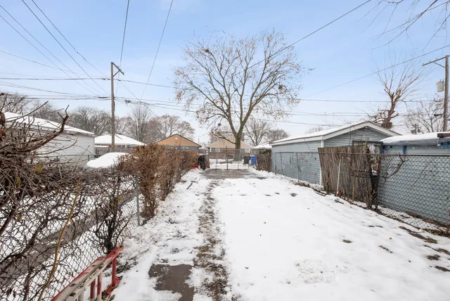 a view of a backyard of snow