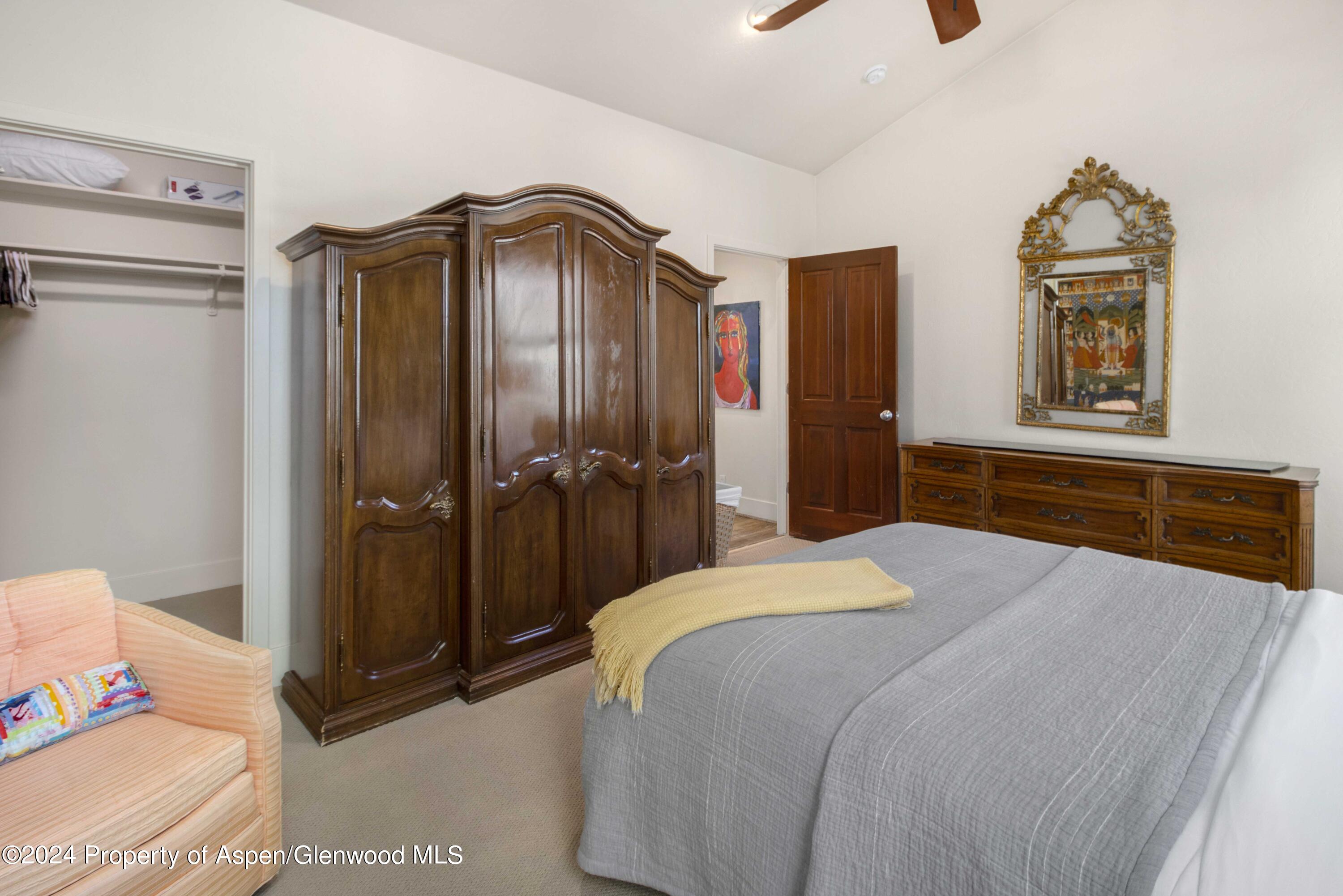 532 Evans Court Basalt, CO 81621 - Photo 13 of 22 a bedroom with a bed and a dresser
