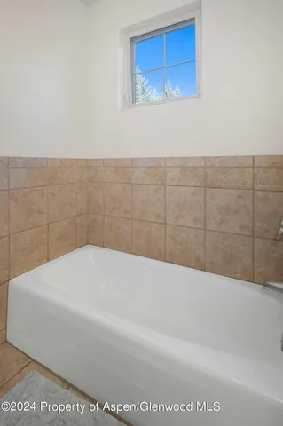 a bathroom with a bathtub
