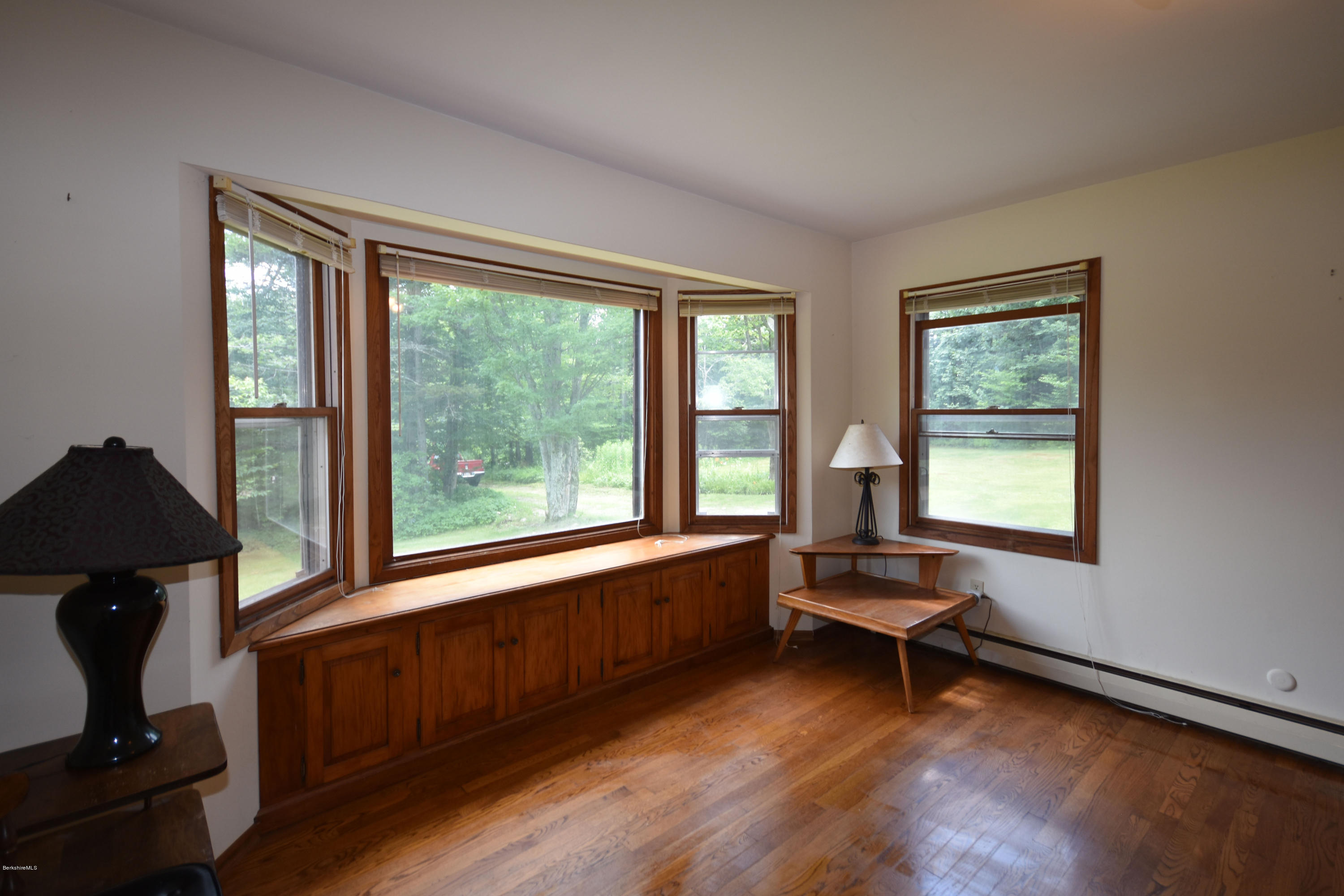 247 East Windsor Road Peru, MA 01235 - Photo 15 of 42 a living room with furniture and a window