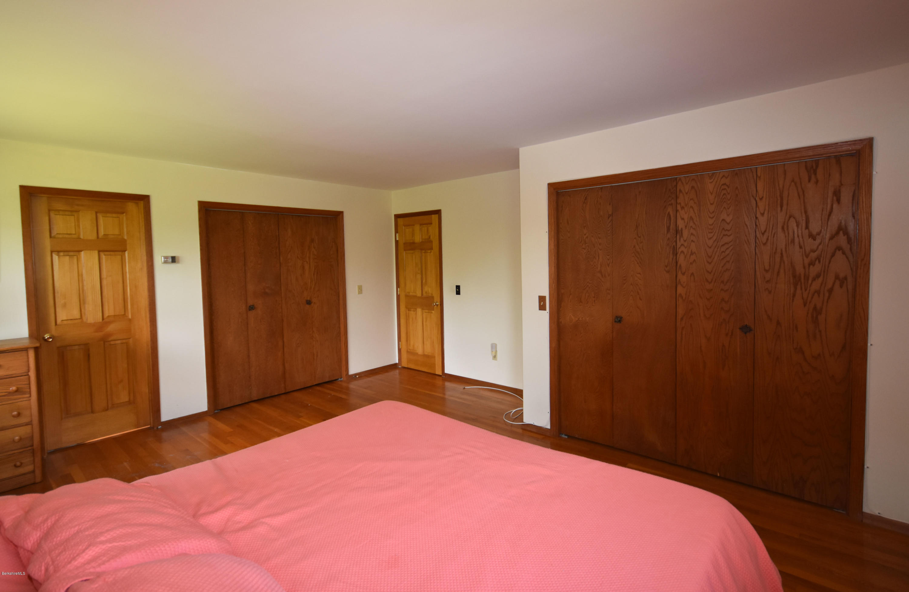 247 East Windsor Road Peru, MA 01235 - Photo 22 of 42 a bedroom with a bed and a closet