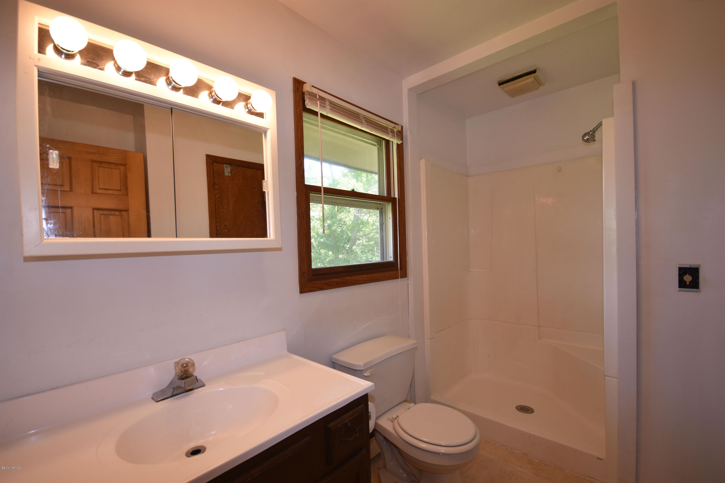 247 East Windsor Road Peru, MA 01235 - Photo 23 of 42 a bathroom with a sink a toilet and shower