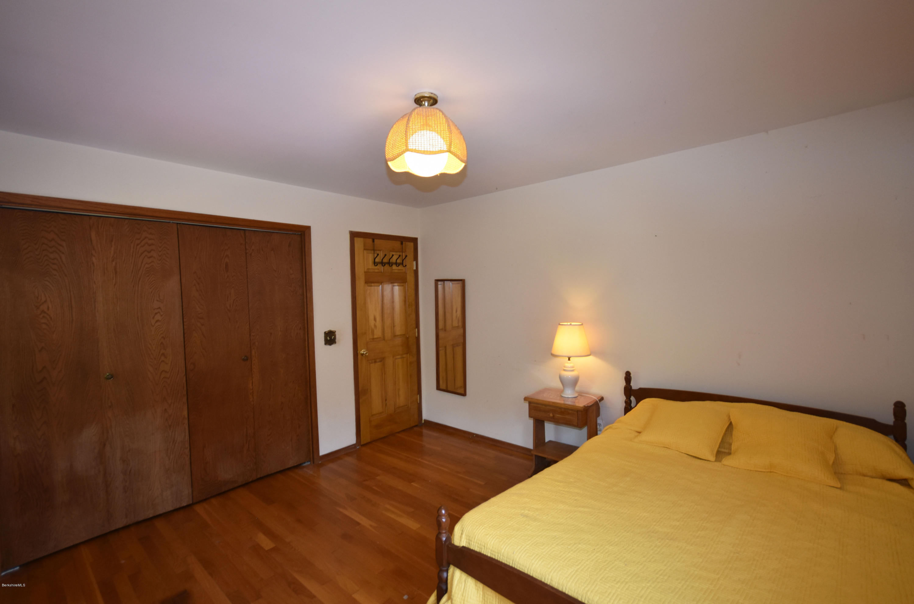 247 East Windsor Road Peru, MA 01235 - Photo 30 of 42 a bedroom with bed and a window